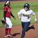 Michigan senior Ashley Lane runs the bases after hitting a home run to end the game against Louisiana-Lafayette on Friday, May 24. Daniel Brenner I AnnArbor.com